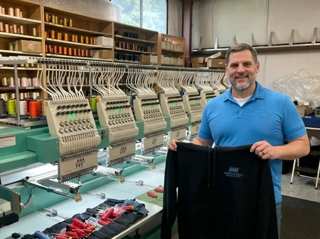Northwest Custom Apparel production facility in Milton, Washington with Tajima embroidery machines.